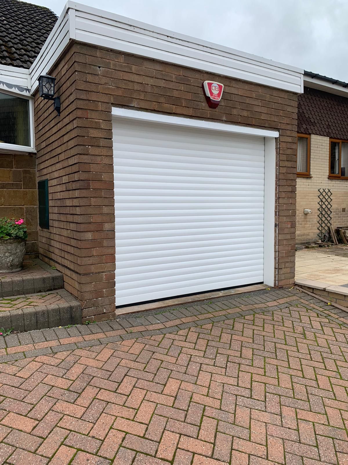 Securoglide Roller Shutter door in White.