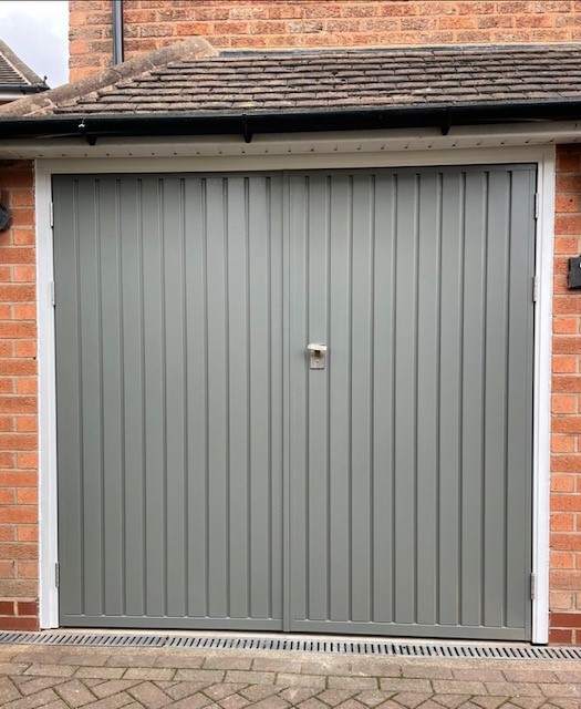 Grey side hinged garage door.